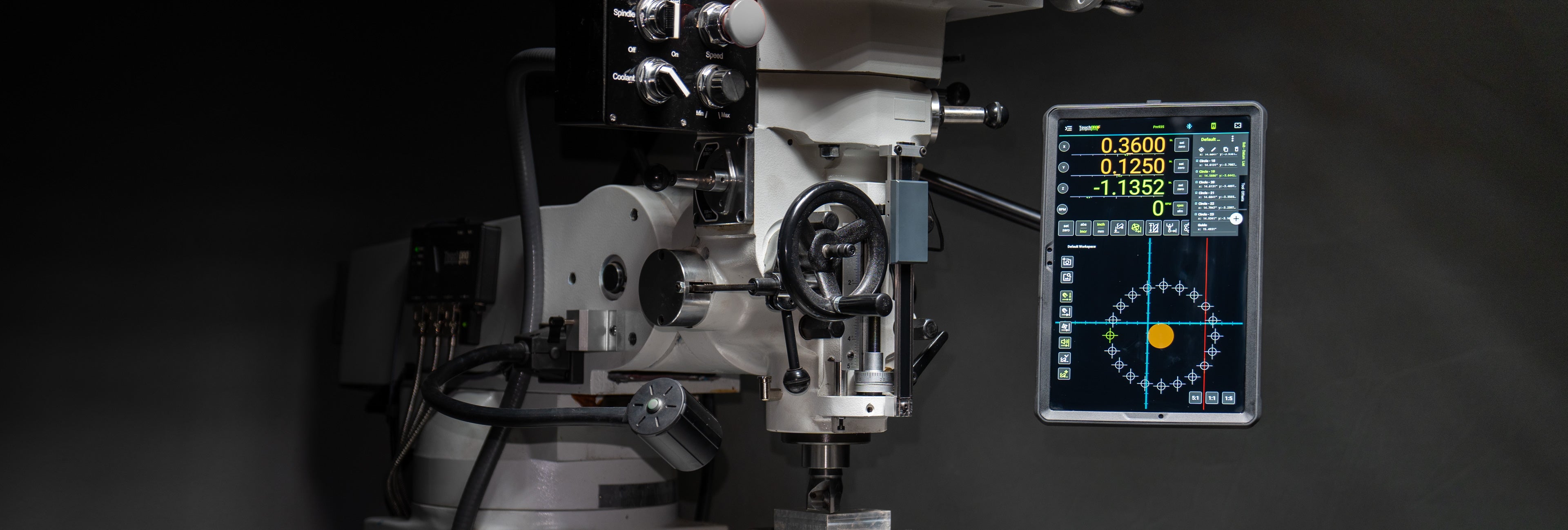 TouchDRO wireless digital readout on an Android tablet mounted to a Bridgeport milling machine, showing live X, Y, and Z axis positions